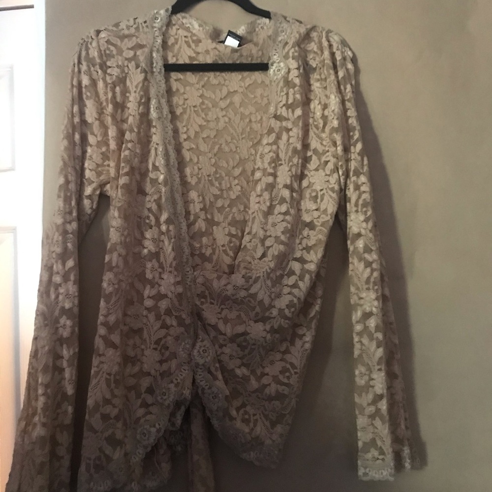 Tan wrap-around sweater. Floral print